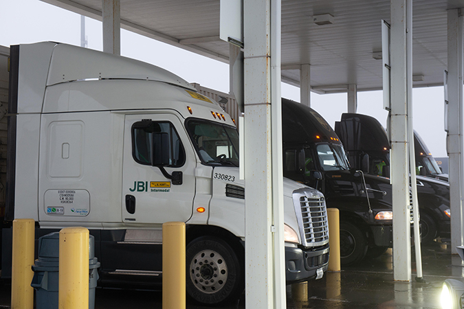 Trucks enter a BNSF intermodal facility, aided by AGS technology. 