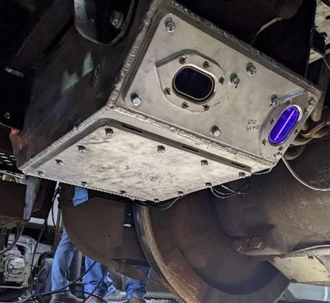 An ODIN unit installed under the locomotive’s draft gear